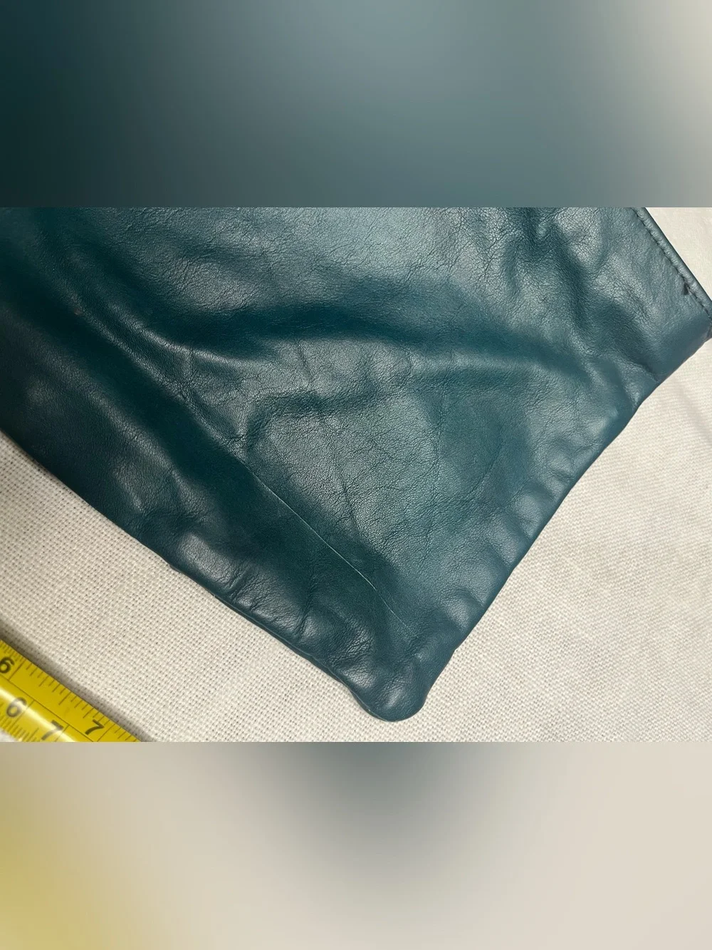 Vintage teal colored leather clutch